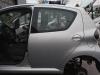 Toyota Aygo original Tür hinten links Fond Fahrerseite 1E7 Merlansilber Bj 2009 Toyota Aygo original Tür hinten links Fond Fahrerseite 1E7 Merlansilber Bj 2009